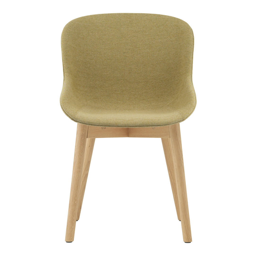 Green upholstered chair with a smooth texture and light wooden legs, perfect for modern decor.