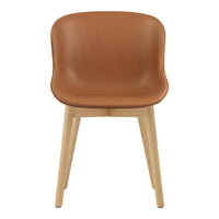 Tan leather chair with smooth, curved design and light wooden legs. Modern and stylish for any decor.