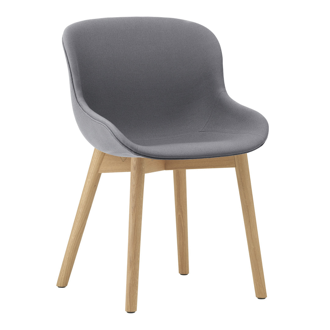 Gray upholstered chair with a smooth finish and natural wood legs, perfect for modern decor.