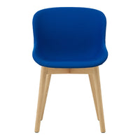 Blue upholstered chair with smooth curves and natural wooden legs, perfect for modern decor.