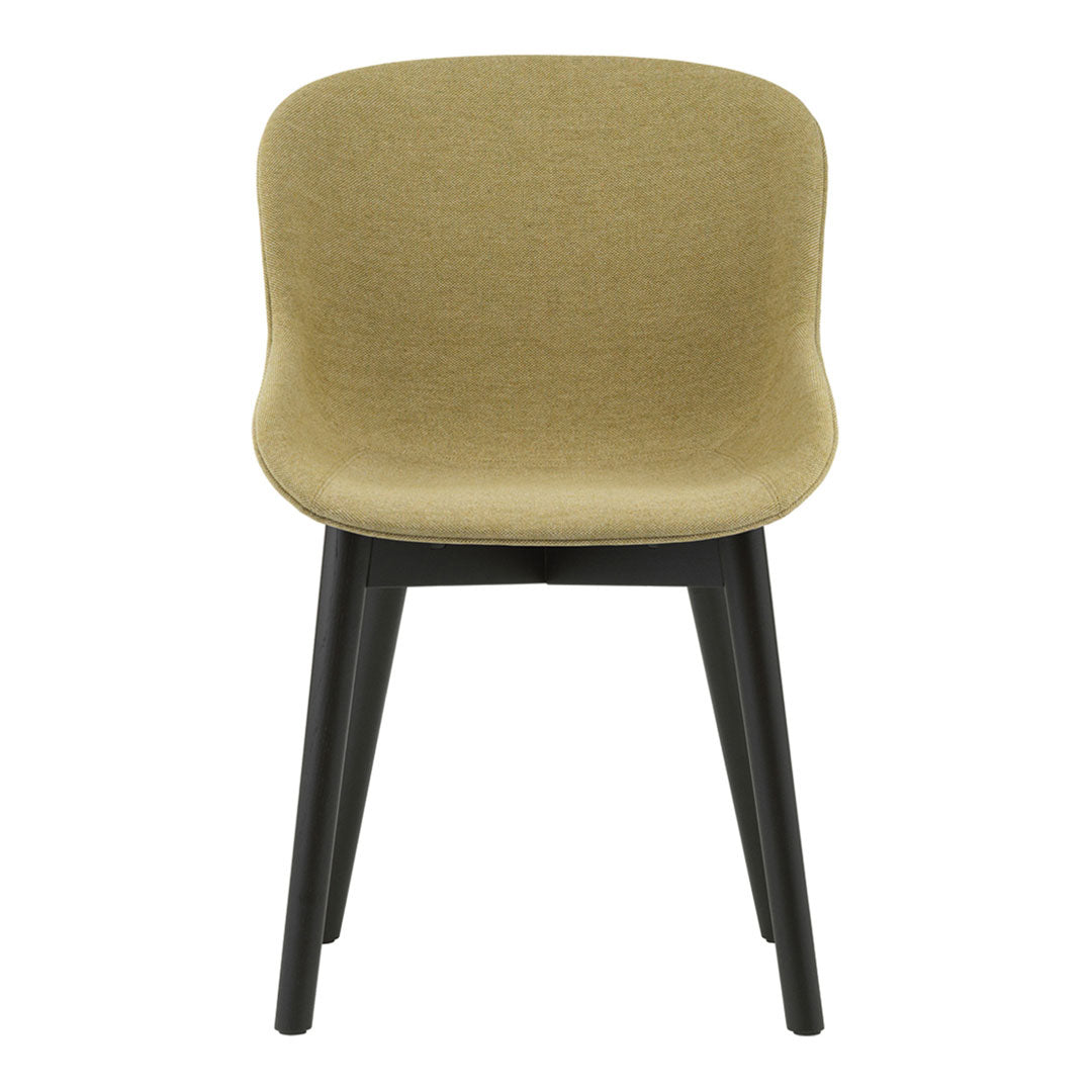 Olive green fabric chair with smooth, curved upholstery and sleek black wooden legs. Modern and minimalist design.