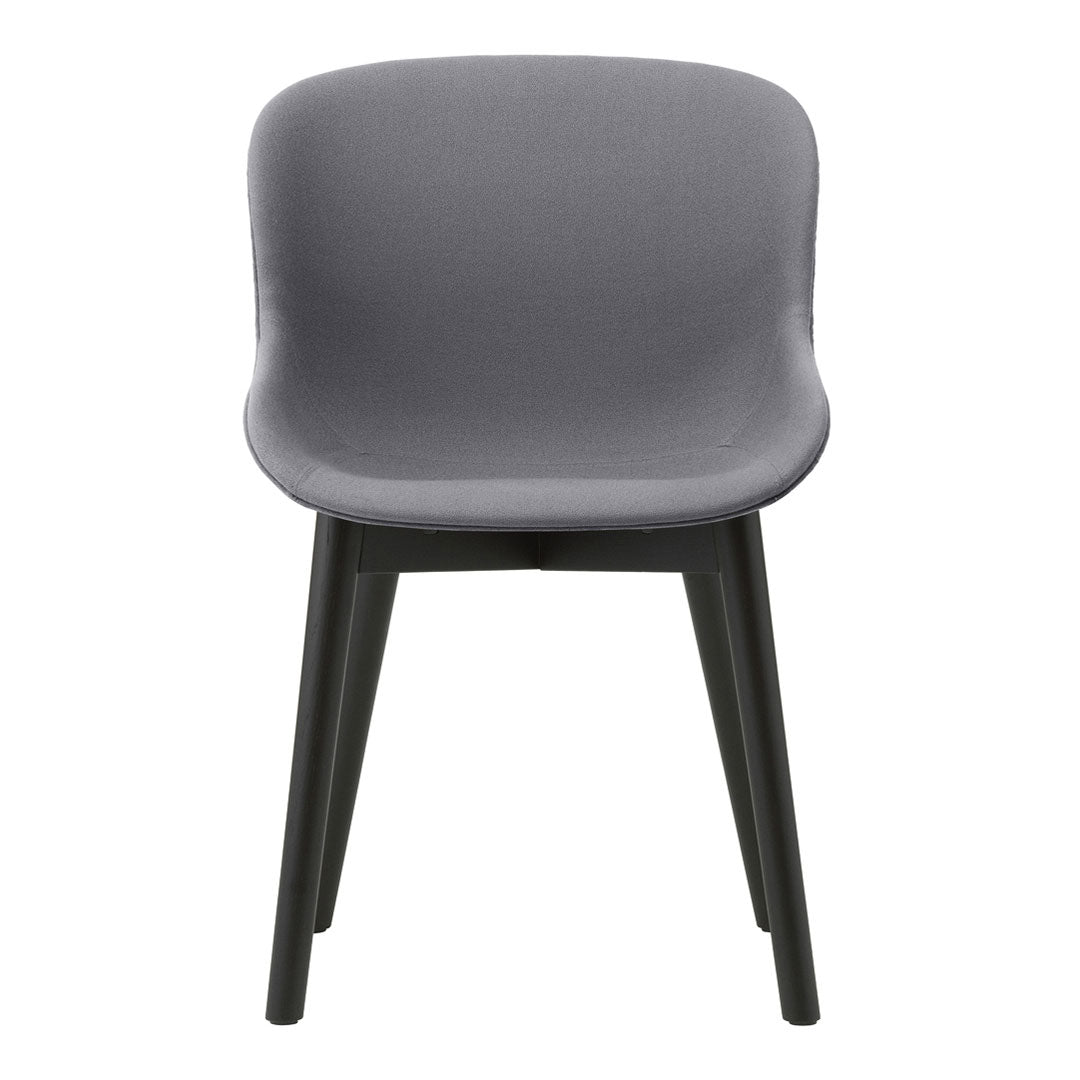 Modern gray chair with a smooth finish and sleek black legs, ideal for contemporary decor.