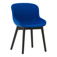 Vibrant blue upholstered chair with sleek black wooden legs. Modern design for stylish interiors.