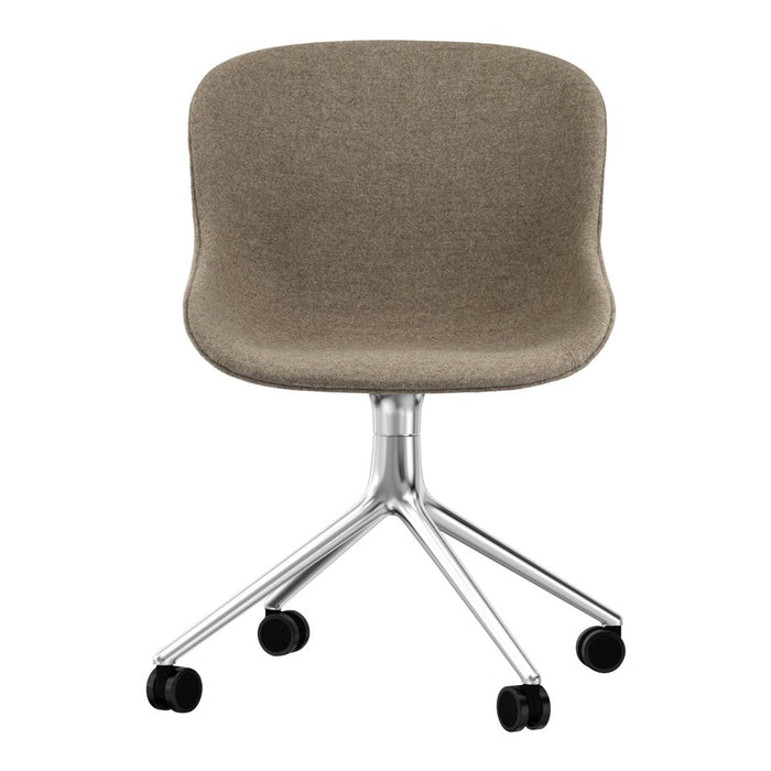 Taupe upholstered chair with smooth curves and a chrome, five-star base; modern and minimalist design.