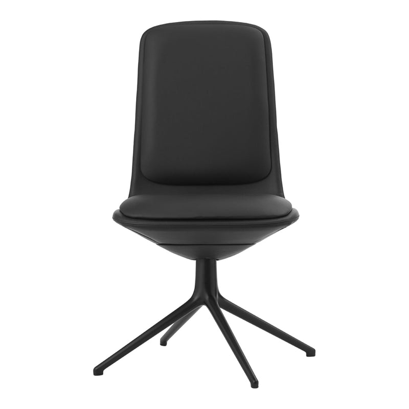 Black upholstered chair with smooth texture and sleek, modern design. Features a minimalist style and star-shaped base.