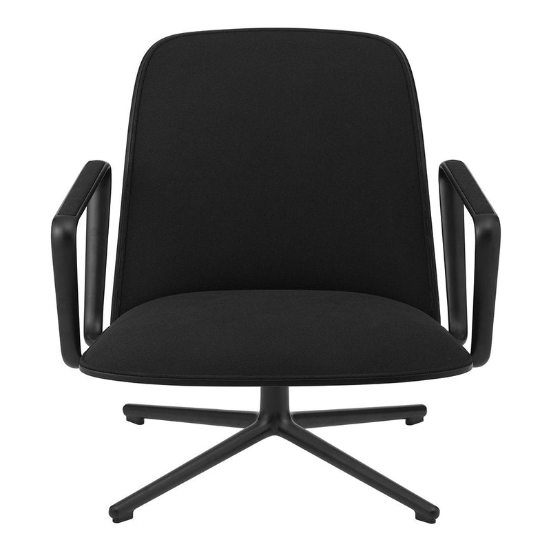 Black upholstered chair with a smooth, modern design and sleek, minimalist arms and base.