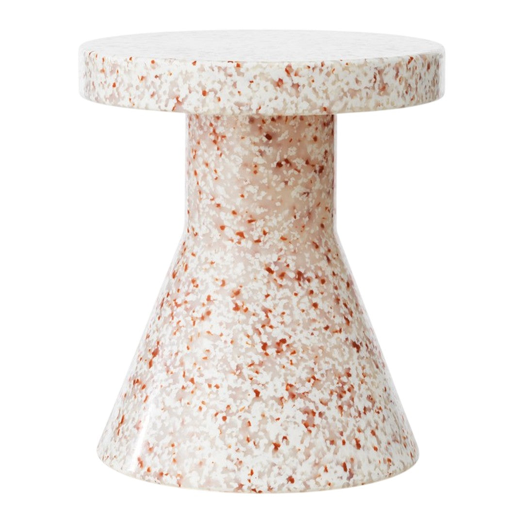 Translucent peach and white speckled side table with a modern, tapered design. Perfect for contemporary decor.