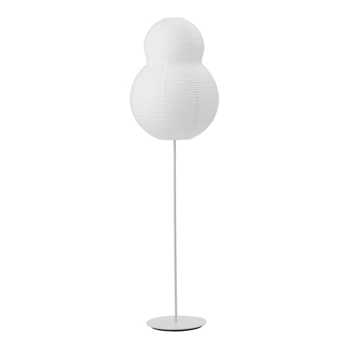 White textured floor lamp with a modern, rounded design and sleek metal base. Ideal for contemporary decor.