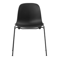 Black minimalist chair with a smooth plastic seat and sleek metal legs, perfect for modern decor.