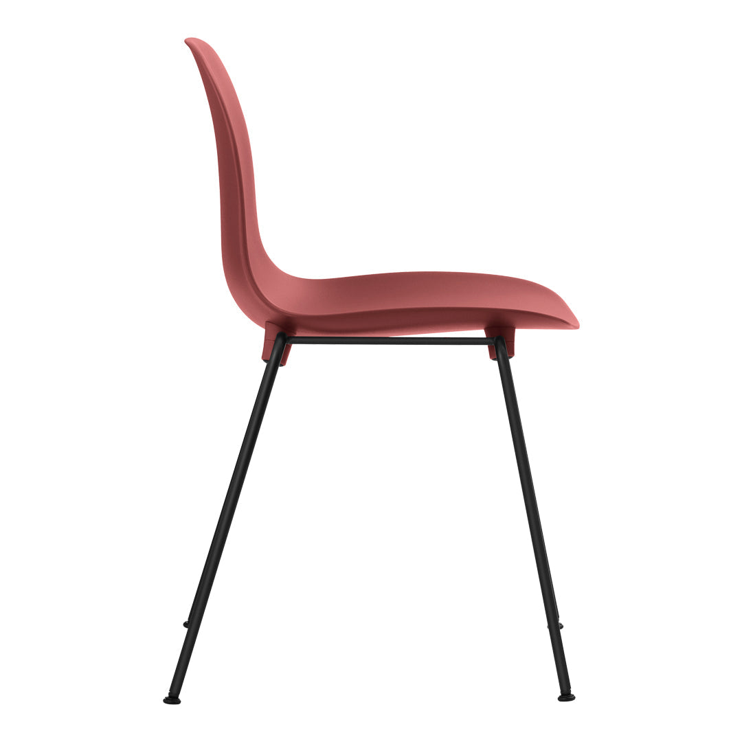 Side view of a modern chair in soft pink with sleek black legs, featuring a smooth, minimalist design.