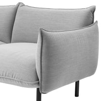 Light gray textured couch with smooth upholstery and sleek black legs. Modern design for any living space.