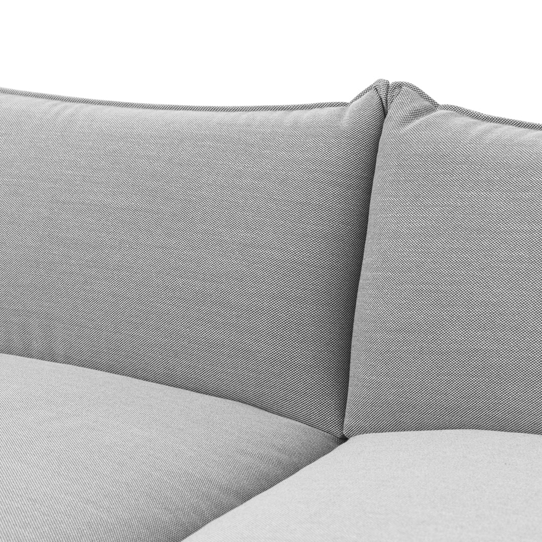 Gray textured fabric sofa cushion with a subtle striped pattern, providing a modern and stylish look.