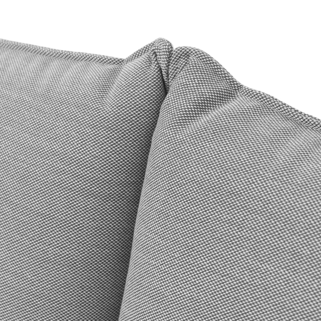 Gray textured fabric with subtle herringbone pattern, ideal for modern upholstery. Soft and stylish for any decor.