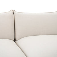 Light beige fabric upholstery with a smooth, minimalist pattern and clean lines. Perfect for modern interiors.