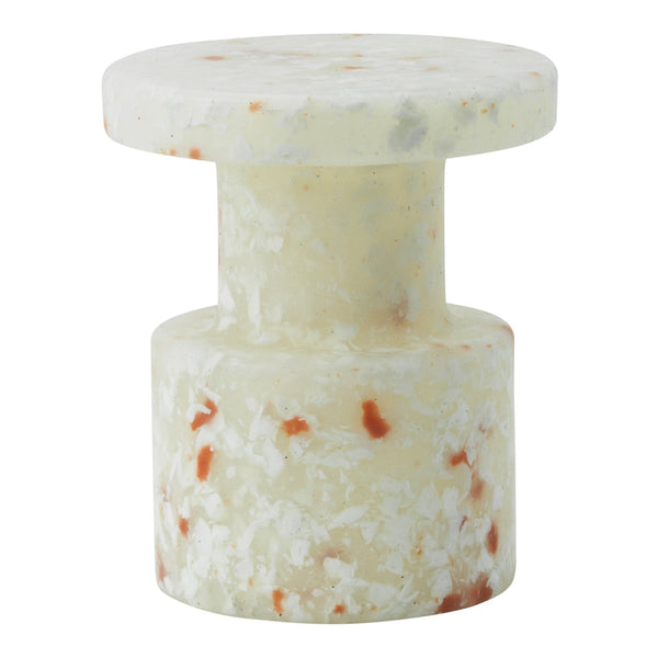 Translucent green and white resin stool with subtle orange flecks, featuring a solid, modern cylindrical design.