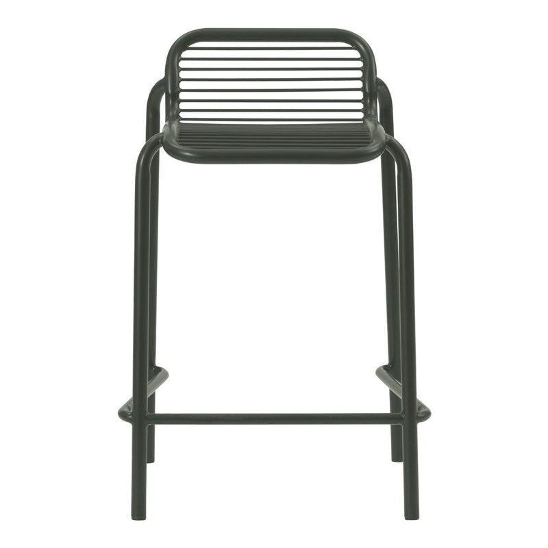Black metal bar stool with sleek horizontal slat design and minimalist silhouette. Ideal for modern decor.