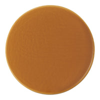 Round, smooth ceramic plate in a warm caramel brown color with a glossy finish. Perfect for modern table settings.