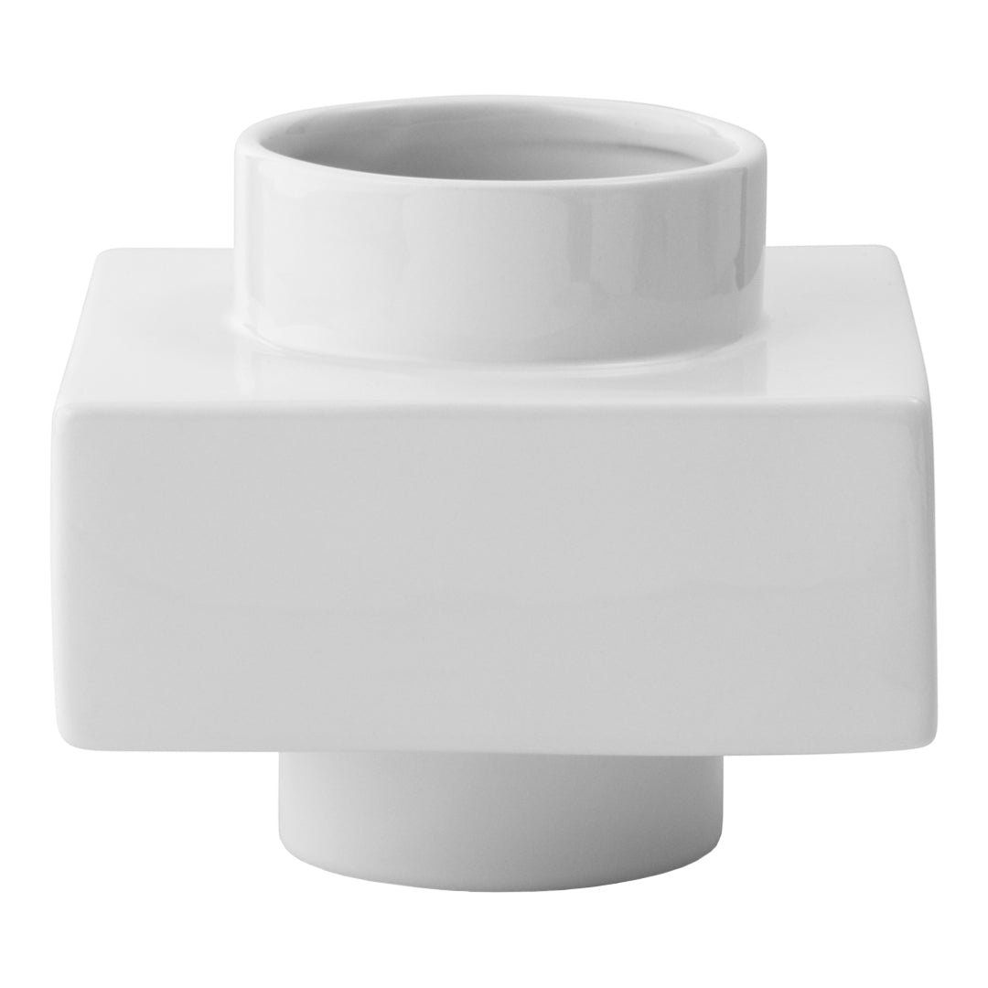 Glossy white ceramic vase with a modern, geometric design and smooth, clean lines. Ideal for contemporary decor.
