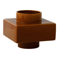 Brown ceramic vase with a glossy finish, featuring a modern square design and cylindrical neck.