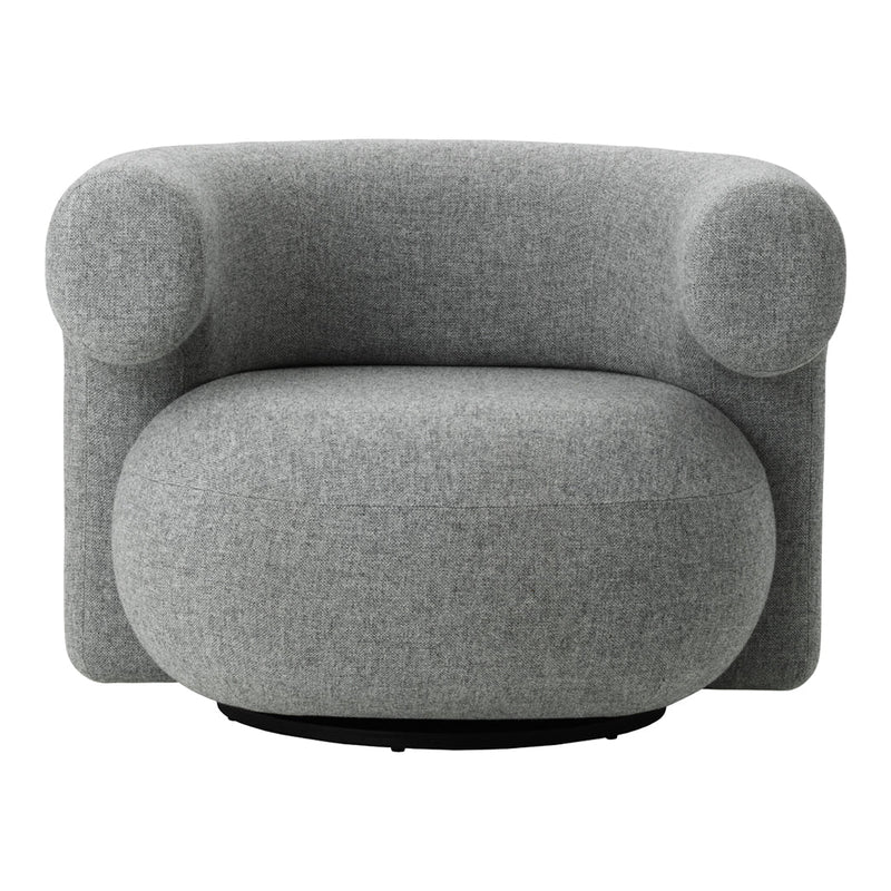 Gray plush armchair with rounded shapes and a minimalist design, featuring a soft fabric texture.
