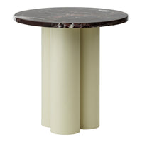Round table with a dark marble top and light green cylindrical base, featuring a modern and sleek design.