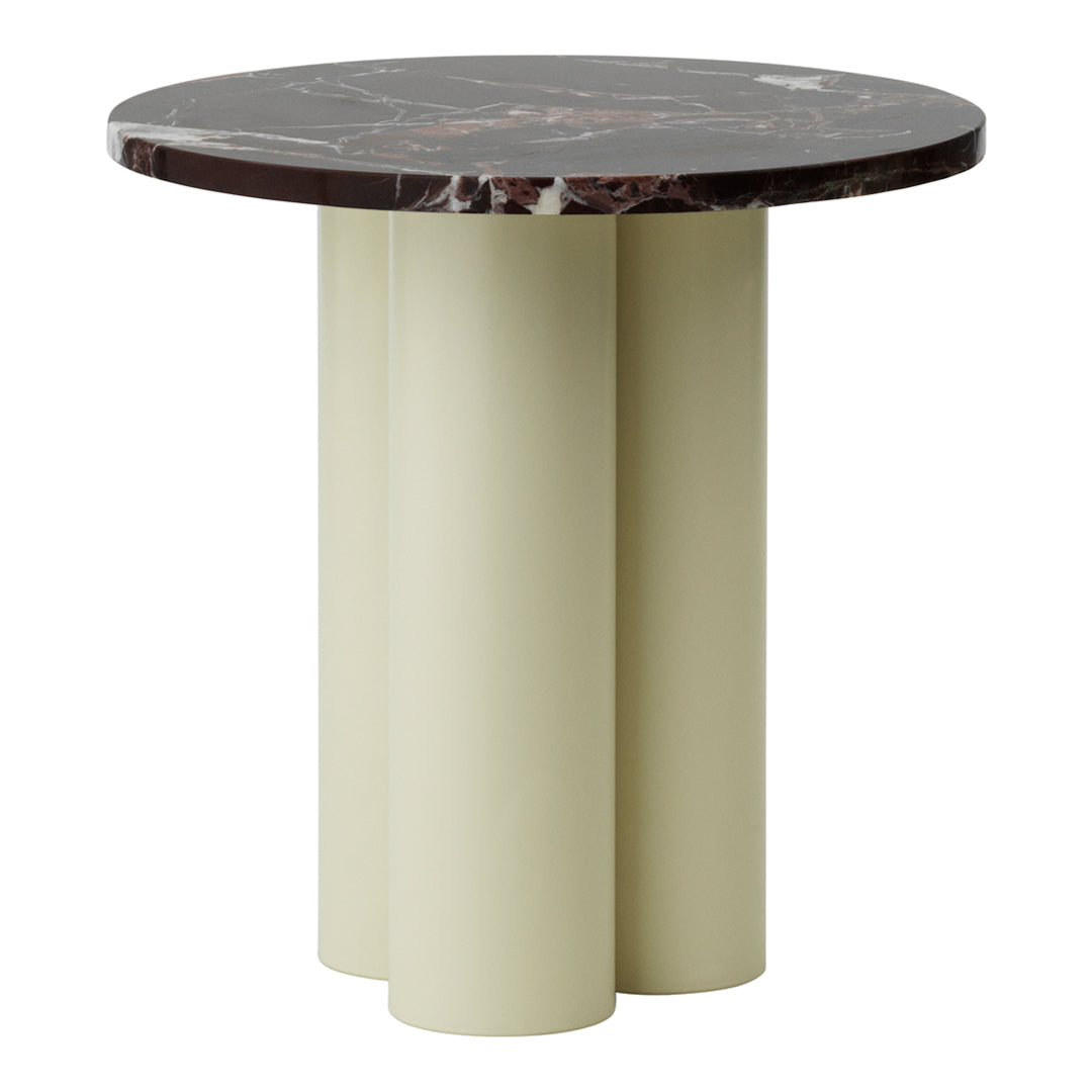 Round table with a dark marble top and light green cylindrical base, featuring a modern and sleek design.