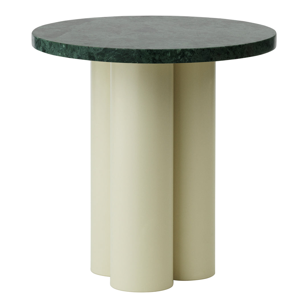 Round table featuring a dark green marble top and cream-colored cylindrical legs, showcasing a modern, minimalist design.