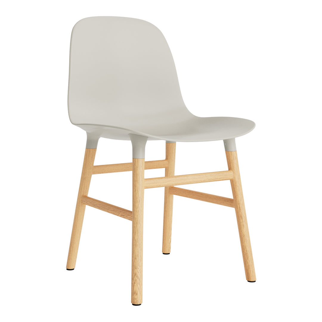 Stylish gray chair with smooth finish and natural wood legs, perfect for modern decor.