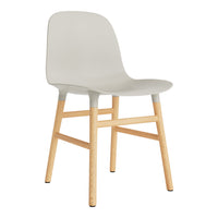 Stylish gray chair with smooth finish and natural wood legs, perfect for modern decor.
