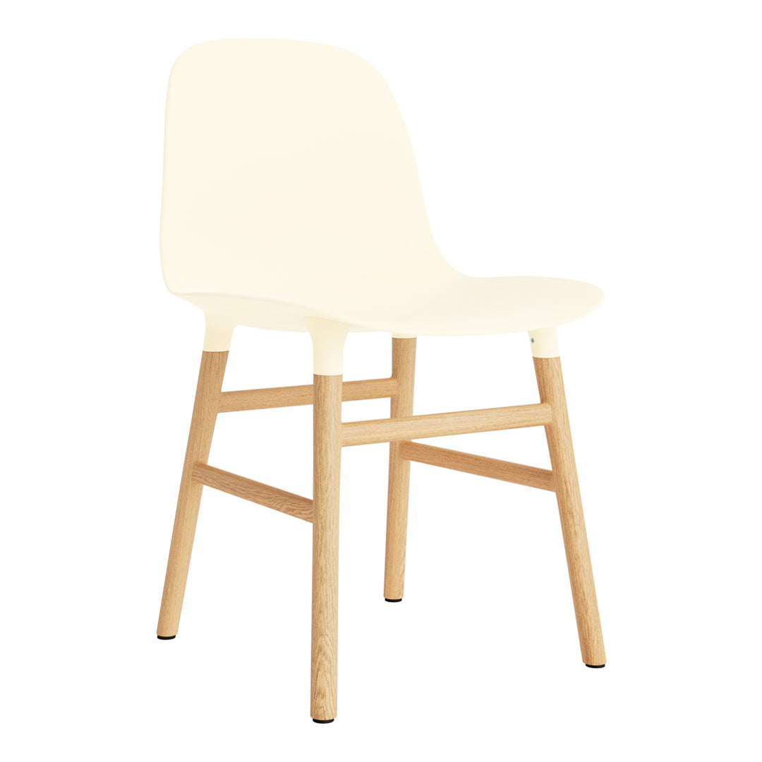 Cream-colored chair with a smooth finish and natural wood legs. Minimalist design complements any decor style.