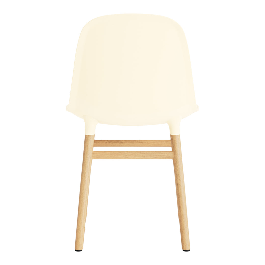 Cream chair with a smooth finish and natural wood legs, showcasing a minimalist design and elegant simplicity.