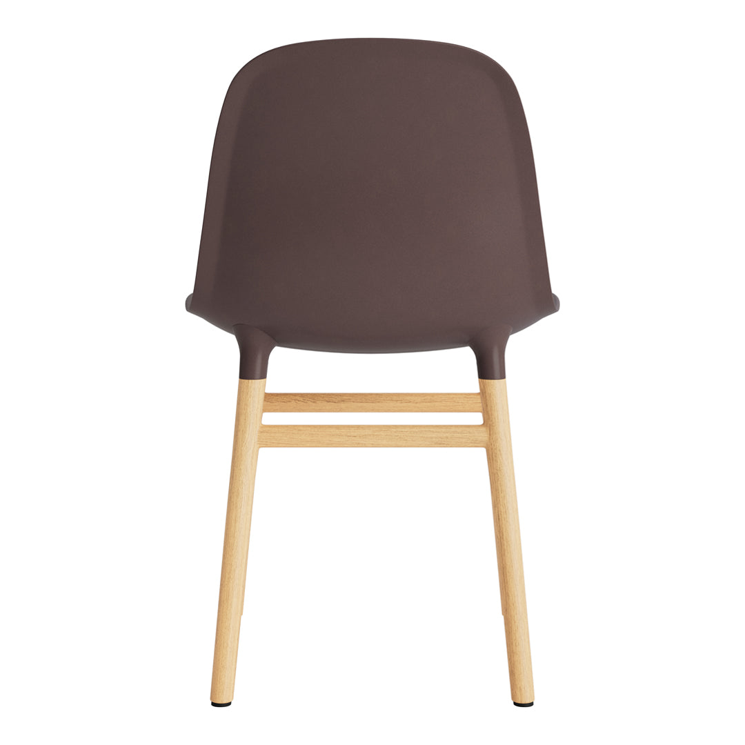 Brown plastic chair with natural wood legs, featuring a simple, modern design. Ideal for contemporary decor.