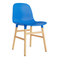 Vibrant blue chair with a smooth plastic seat and natural wood legs, perfect for a modern seating solution.
