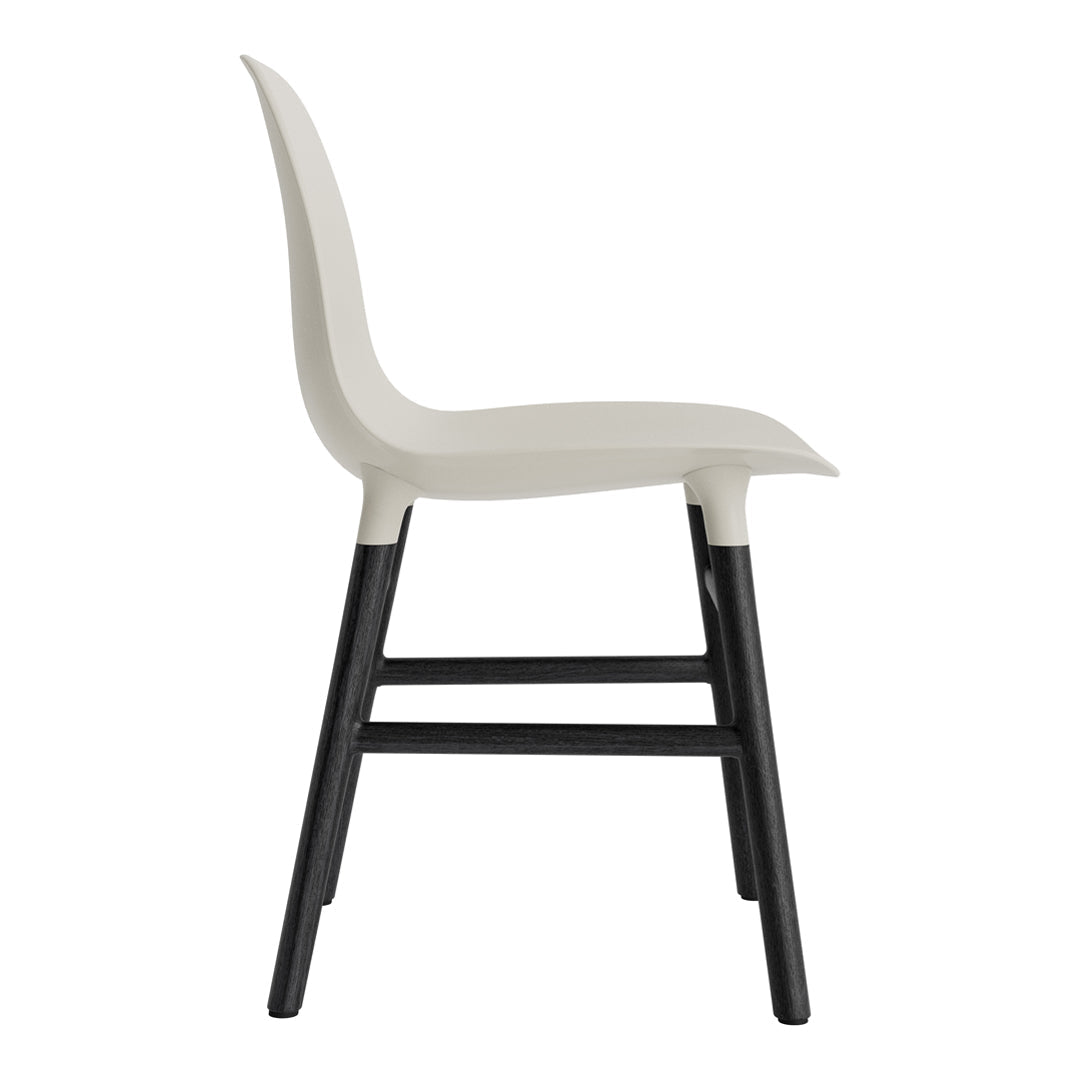 Light gray chair with a sleek design and black legs, featuring a smooth, minimalist finish. Ideal for modern decor.