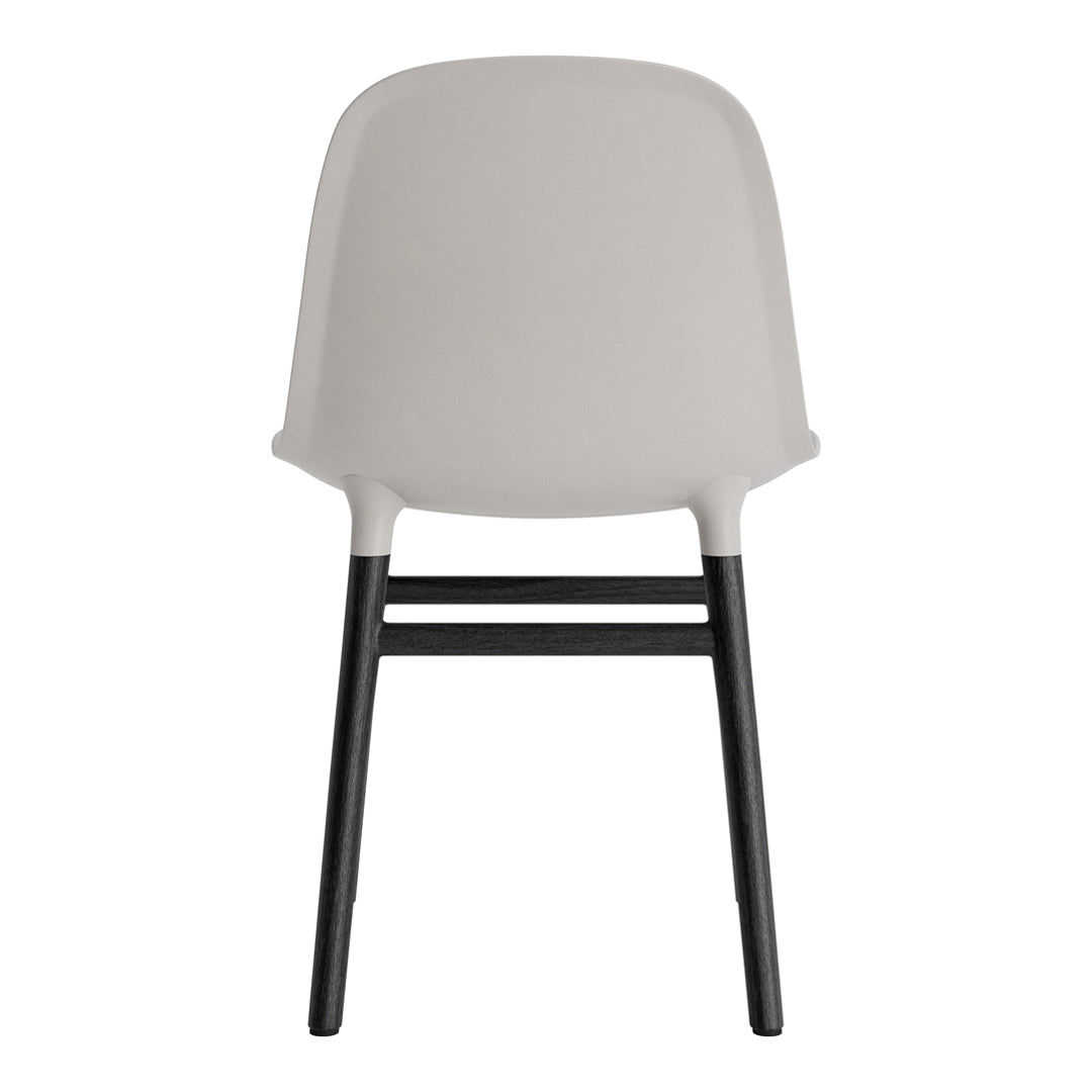 Gray chair with a sleek design and contrast black legs, perfect for modern decor.
