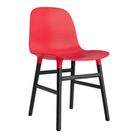 Red plastic chair with a sleek design and contrasting black wooden legs. Modern and stylish addition to any space.
