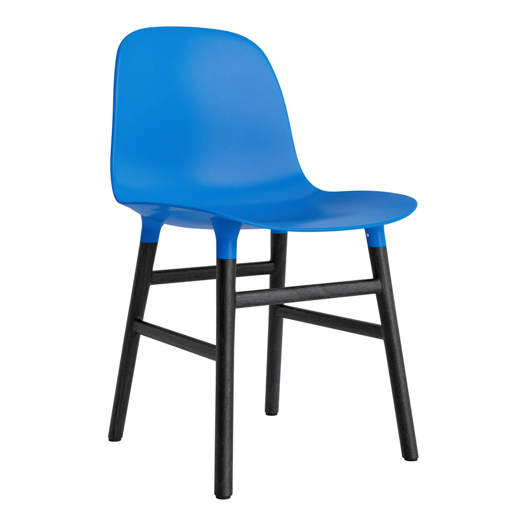 Vibrant blue chair with a smooth surface and contrasting black wooden legs, perfect for modern decor.