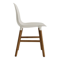White chair with smooth curves and natural wood legs; minimalist design featuring a sleek, modern aesthetic.