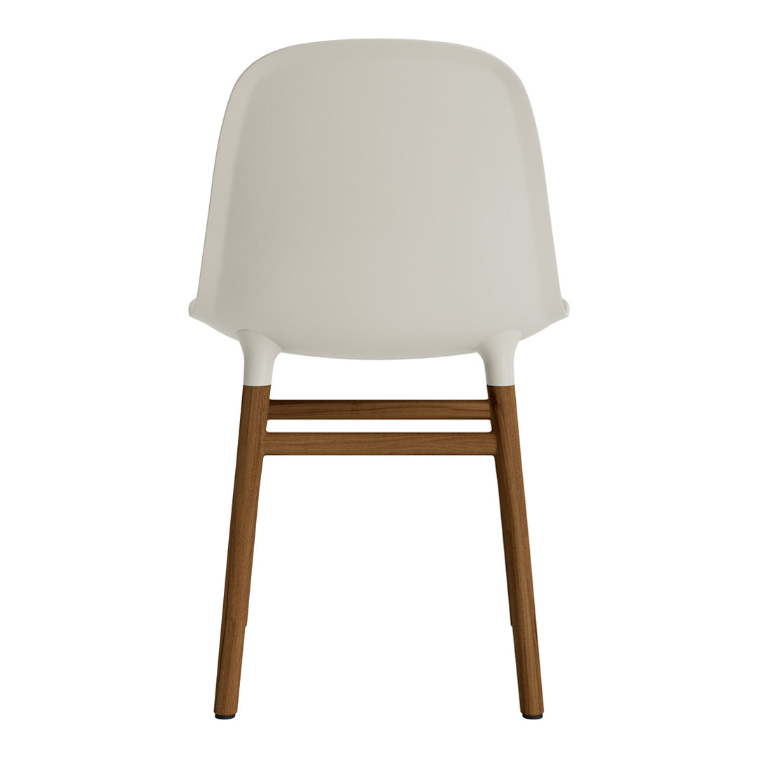 Light gray chair with a smooth, curved seat and natural wood legs, featuring a minimalist design and neutral tones.