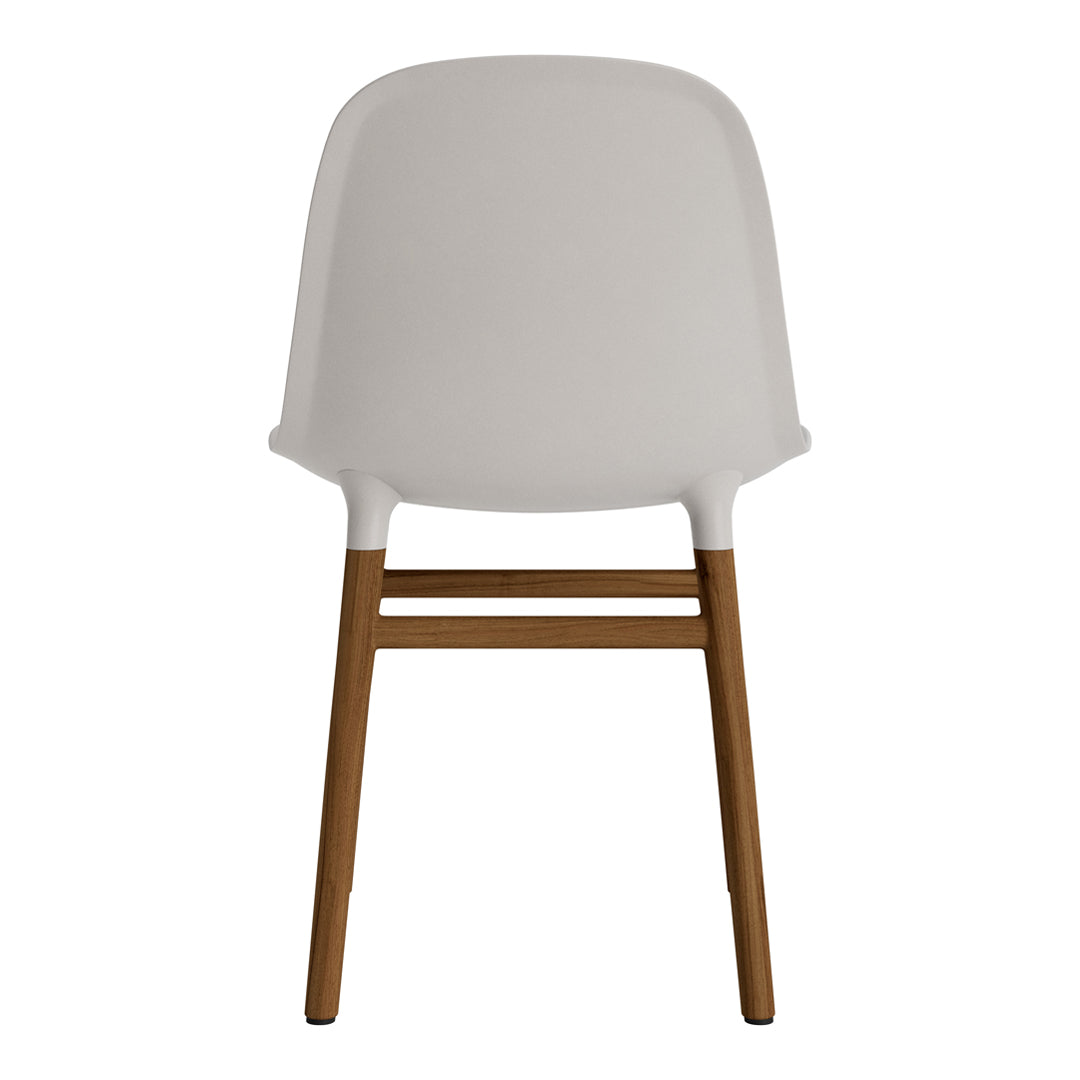 Minimalist white chair with smooth finish and natural wood legs, perfect for modern decor.