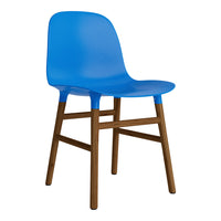 Bright blue plastic chair with a sleek design, featuring a natural wood frame for a modern, stylish look.