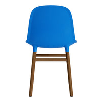 Bright blue chair with a smooth finish and natural wooden legs, adding a vibrant touch to any space.