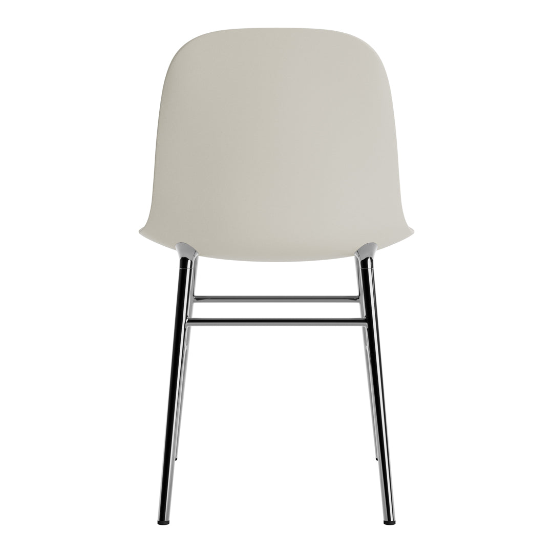 Light gray chair with a smooth, minimalist design and sleek chrome legs. Perfect for modern decor.