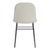 Light gray chair with a smooth, minimalist design and sleek chrome legs. Perfect for modern decor.