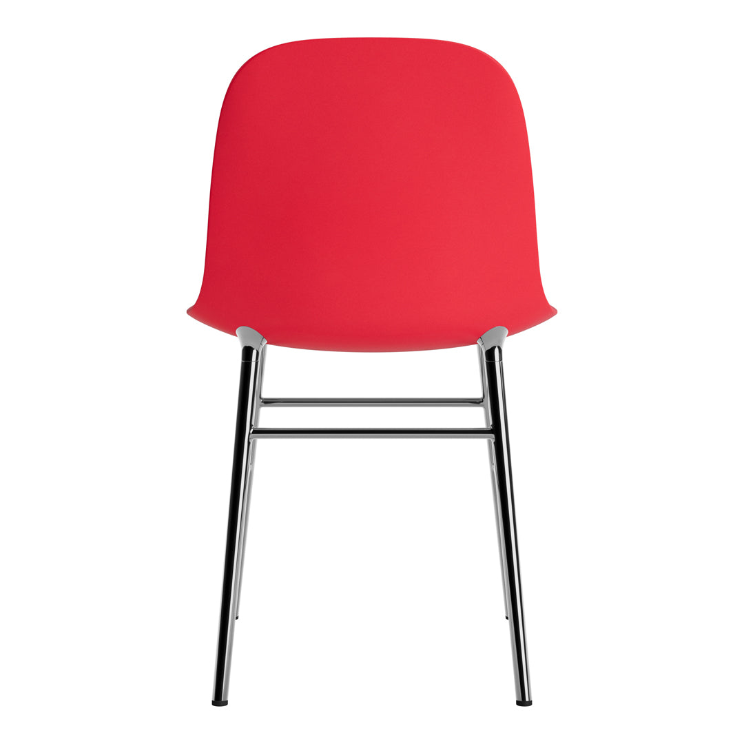 Red sleek chair with a smooth finish and chrome legs, perfect for modern decor.
