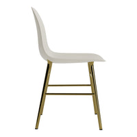 White chair with a sleek, minimalist design and gold metal legs, showcasing a modern aesthetic.