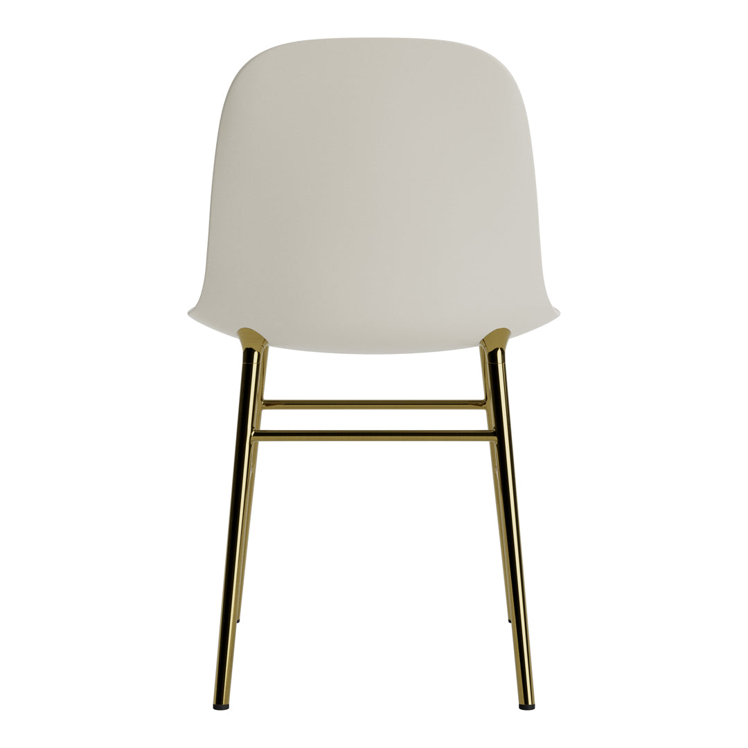 Cream-colored chair with a sleek, smooth design and gold metal legs, adding a modern touch to any room decor.