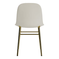 Cream-colored chair with a sleek, smooth design and gold metal legs, adding a modern touch to any room decor.