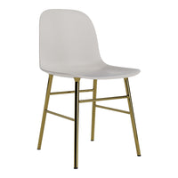 White molded chair with sleek gold metal legs, featuring a minimalist design and smooth finish.