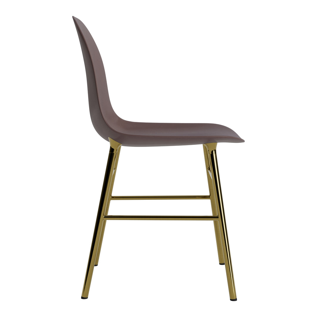 Stylish side view of a taupe chair with a sleek gold metal frame. Perfect modern accent for any space.